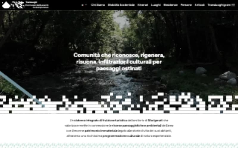 Transluoghi Ecomuseo homepage with a forest stream and its Italian navigation